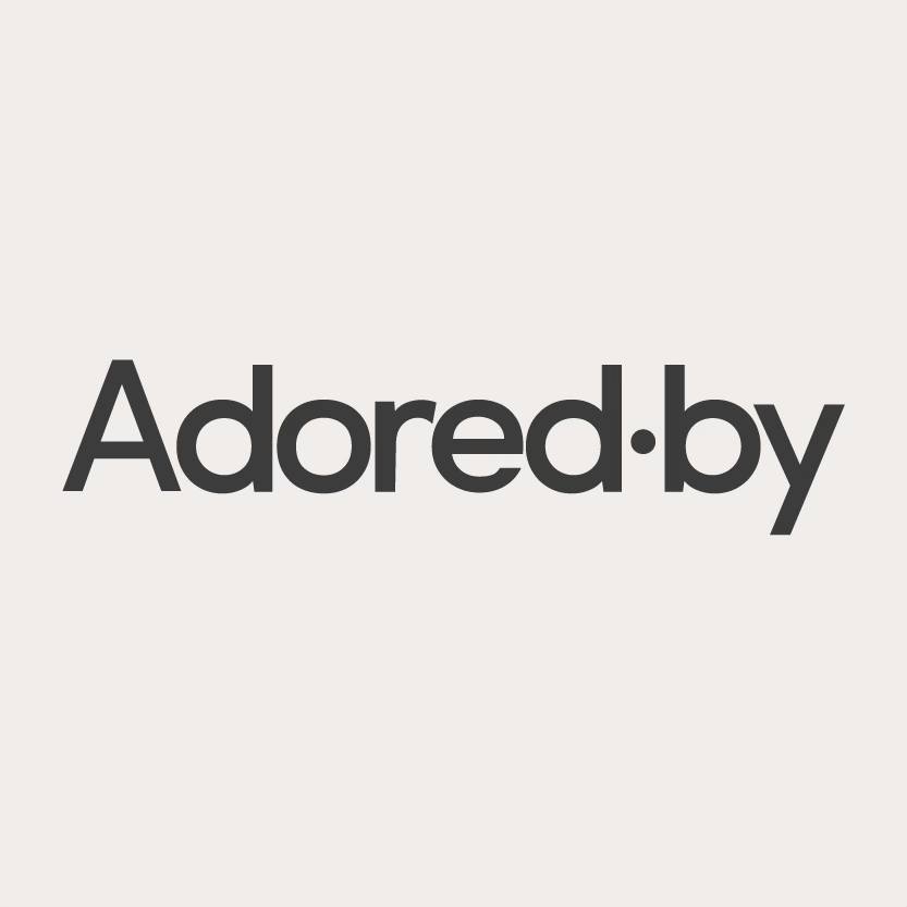 Adored by logo